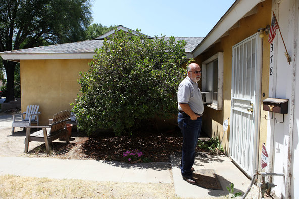 Joe Cusumano, a real estate agent, outside a home in Riverside, Calif. He said much of his business came from large investors.