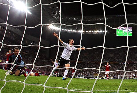 Germany beat Denmark at the Euro 2012 soccer championship on Sunday setting up a quarterfinal face-off with Greece on Friday.