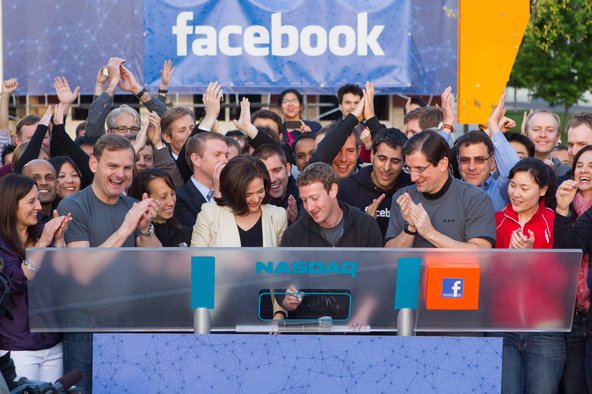 Facebook executives ring the opening bell on May 18 with Nasdaq chief Robert Greifeld.