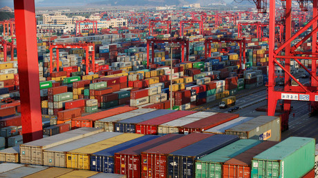 Container boxes are seen at the Yangshan Deep Water Port © Aly Song
