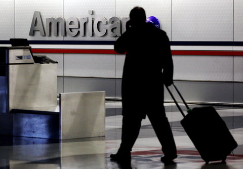 A traveler at an American Airlines terminal.