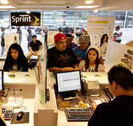 Customers lined up to purchase an iPhone at the Sprint store in San Francisco.