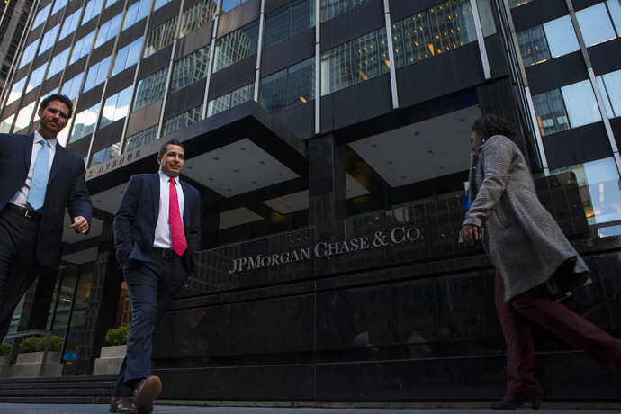 People walk by the JP Morgan  Chase Co. building in New York. (Reuters/Eric Thayer)