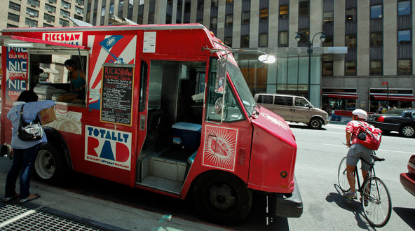 The Rickshaw Dumpling truck often parked near the old offices of Goldman Sachs on Broad Street; above, at Broadway and 55th and 56th Street.