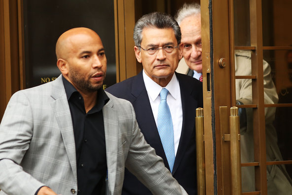 Rajat Gupta, center, a former Goldman Sachs director, was sentenced to two years in prison last year in an insider trading case.