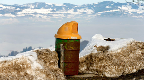 An old oil barrel is used as a rubbish bin beside a mountain road near the village of Schindellegi south of Zurich © Arnd Wiegmann 