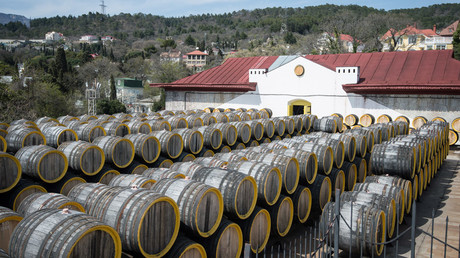 Rows of oak barrels for fermenting Madeira wine at the Massandra wine-making factory. © Mihail Mokrushin