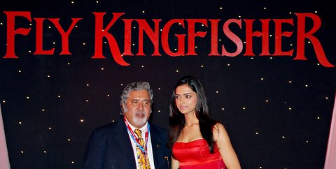 Vijay Mallya, left, with Bollywood actress Deepika Padukone during a press conference in Mumbai, Maharashtra in this Oct. 30, 2007 file photo.