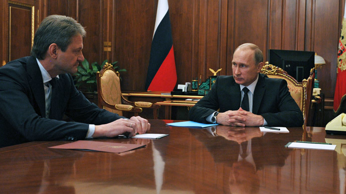 President Vladimir Putin (R) and Agriculture Minister Alexander Tkachyov (RIA Novosti / Michael Klimentyev)
