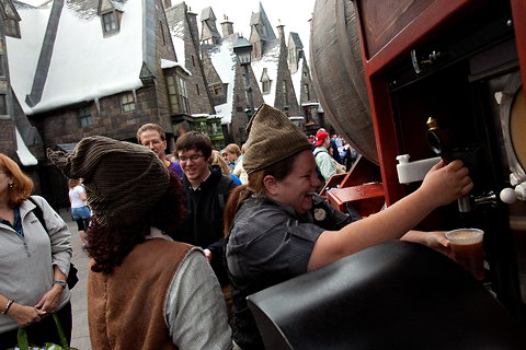 Patrons line up for butterbeer at the Wizarding World of Harry Potter in Orlando.