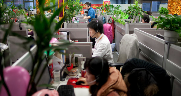Employees at the headquarters of the e-commerce Alibaba.com subsidiary in Hangzhou, Zhejiang Province, in February.