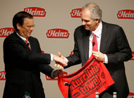 William Johnson, left, the chief of H.J. Heinz, and Alex Behring, a managing partner at 3G Capital.