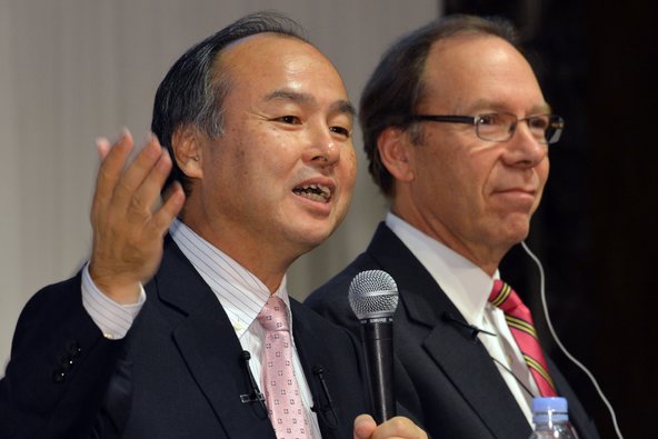 Masayoshi Son of SoftBank, left, and Dan Hesse, chief executive of Sprint Nextel, announced their companies' deal last October.