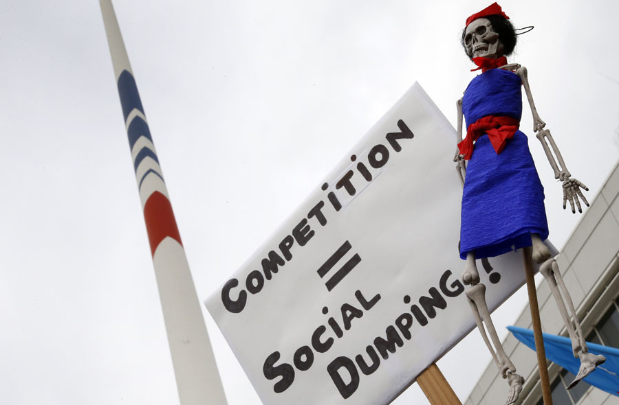 A skeleton doll with a stewardess costume is seen during a demonstration by striking employees of Air France in front of the Air France headquarters building at the Charles de Gaulle International Airport in Roissy, near Paris, France, October 5, 2015. © Jacky Naegelen