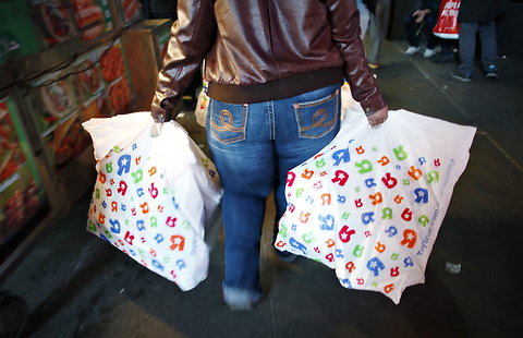 A holiday shopper in New York's Times Square.