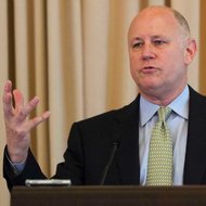 Jeffrey Sprecher, the chief of the IntercontinentalExchange, would keep that role in the newly enlarged market operator.