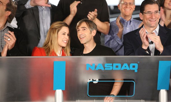 Zynga’s chief, Mark Pincus, center, with his wife, Ali, after he rang the Nasdaq’s opening bell.