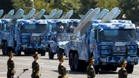 Marine corps vehicles carrying ship-to-air missiles drive past the Tiananmen Square during the military parade marking the 70th anniversary of the end of World War Two, in Beijing © Damir Sagolj