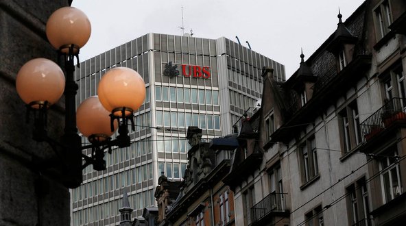 UBS agreed to record fines to settle a rate-rigging case.