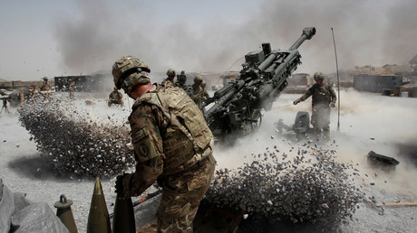 U.S. Army soldiers from the 2nd Platoon, B battery 2-8 field artillery, fire a howitzer artillery piece at Seprwan Ghar forward fire base in Panjwai district, Kandahar province southern Afghanistan © Baz Ratner