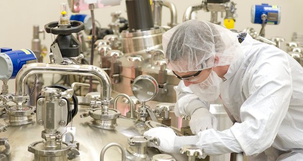 A technician at work in a Human Genome Sciences laboratory in Rockville, Md.