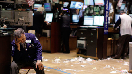A trader sits down, on the floor of the New York Stock Exchange © Brendan McDermid