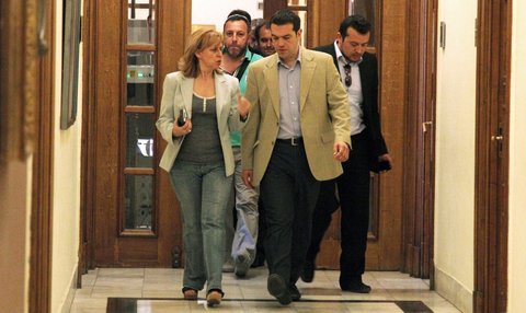 Alexis Tsipras, center, entering the Greek Parliament on Monday.