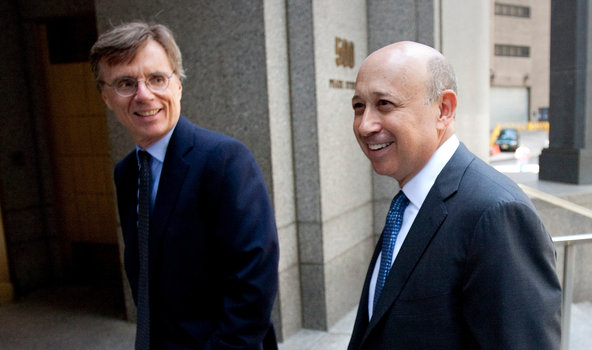 Lloyd Blankfein, chief executive of Goldman Sachs, arriving at federal court on Thursday with Gregory Palm, Goldman's general counsel, at left.