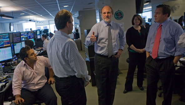 Jon S. Corzine, center, was chief executive of MF Global, which could be missing as much as $1.2 billion in client money.
