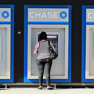 JPMorgan Chase's credit card business and commercial lending operation showed signs of improving.