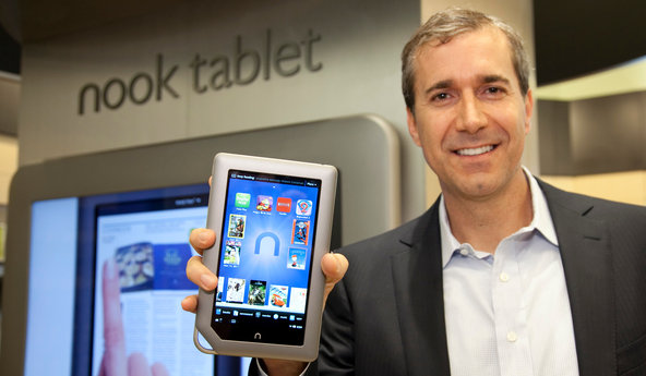 William Lynch, Barnes  Noble's chief executive, shows off the Nook tablet at a bookstore in Manhattan.
