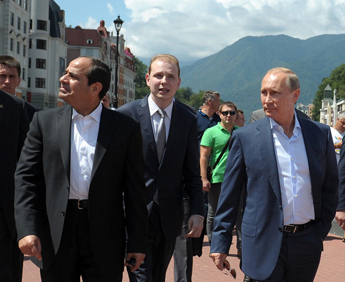 Russian President Vladimir Putin (R) and his Egyptian counterpart Abdel Fattah al-Sisi (L) walk on the main embankment in the Roza Khutor Village outside Sochi on August 12, 2014 during the Egyptian leader's first official visit to Russia. (AFP Photo / Alexei Druzhinin)