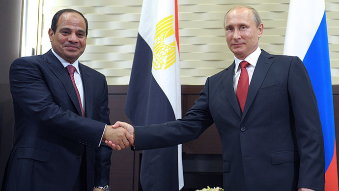 Russian President Vladimir Putin (R) shakes hands with his Egyptian counterpart Abdel Fattah al-Sisi (L) during their meeting at the Bocharov Ruchei residence in Sochi on August 12, 2014 during the Egyptian leader's first official visit to Russia. (AFP Photo / Alexei Druzhinin)