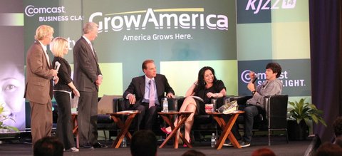 Alan Hall, standing in striped suit, at a Grow America competition.