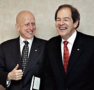 Michael Roach, left, CGI's chief executive, and Serge Godin, the executive chairman, in 2006.