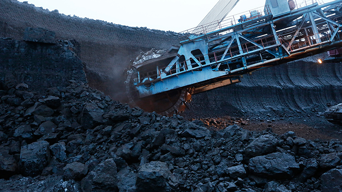A rotary dredge works on the coal face of the Borodinsky opencast colliery, near the Siberian town of Borodino, east of Krasnoyarsk (Reuters / Ilya Naymushin)