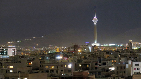 View shows Tehran's skyline at night with the Milad tower © Marius Bosch 