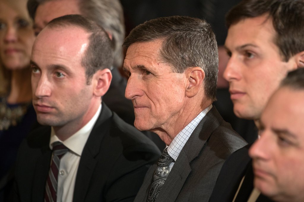 Michael Flynn, center, with Jared Kushner on his left, at a meeting at the White House in February.