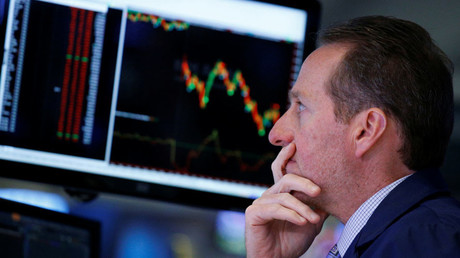 A specialist trader works at his post on the floor of the New York Stock Exchange © Brendan McDermid