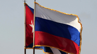 The Cuban and Russian national flags (Reuters/Enrique De La Osa)